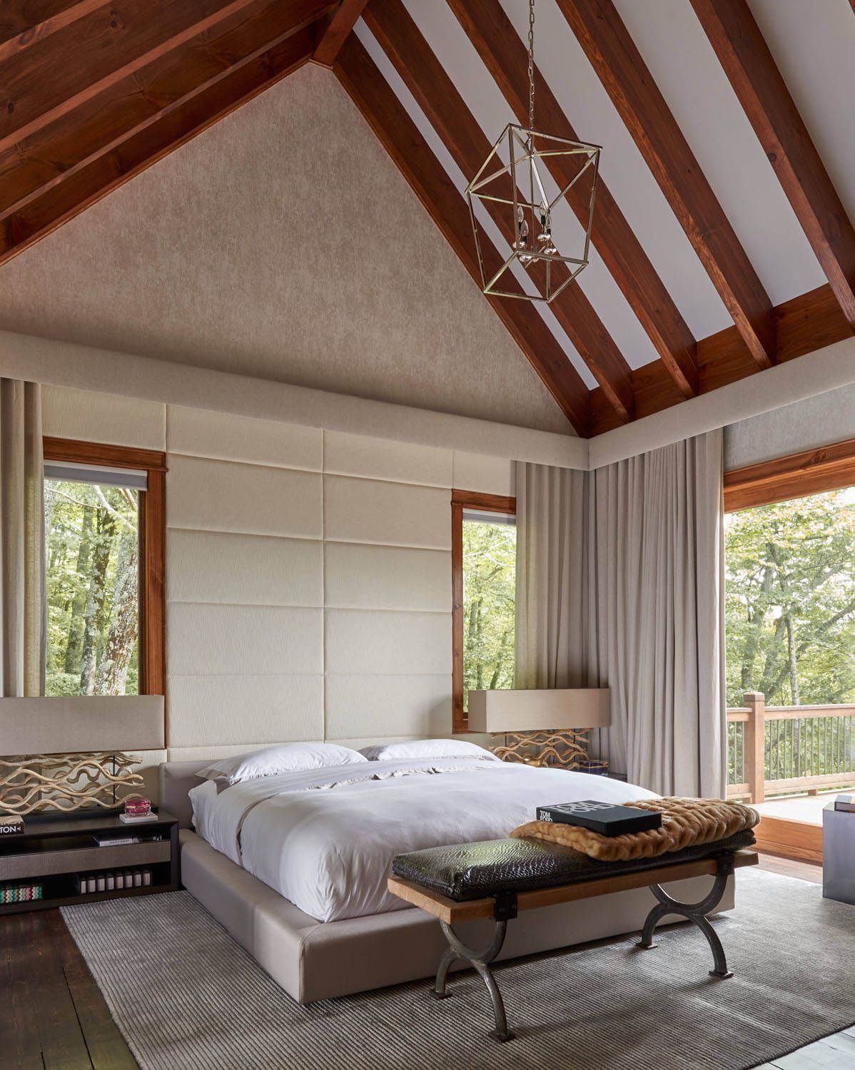 Modern bedroom with a platform bed and vaulted ceiling